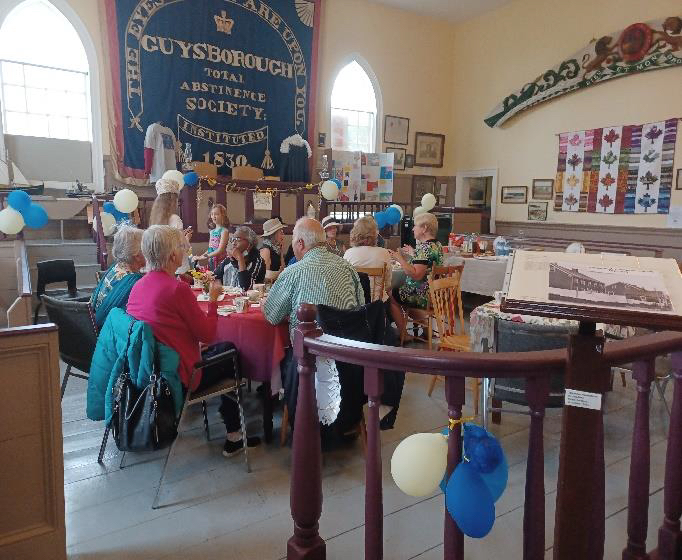 People having tea at the Museum