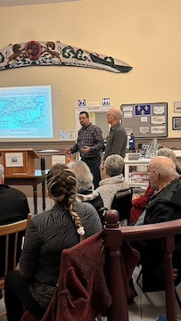 2 people standing next to each other before presentation