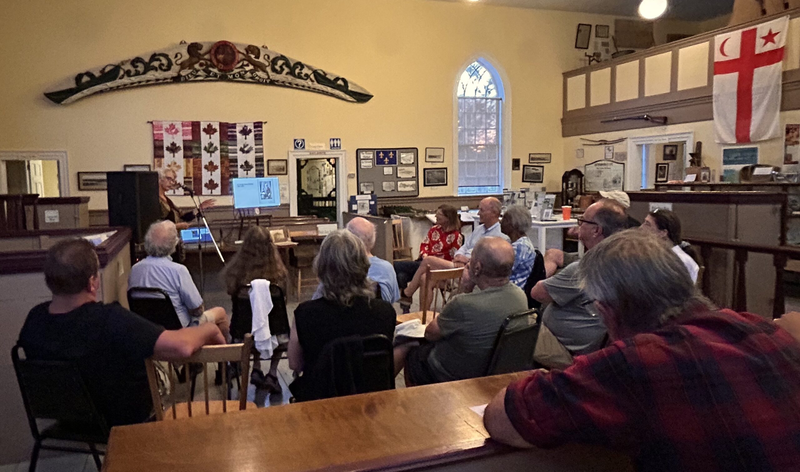 crows sitting in museum for book launch